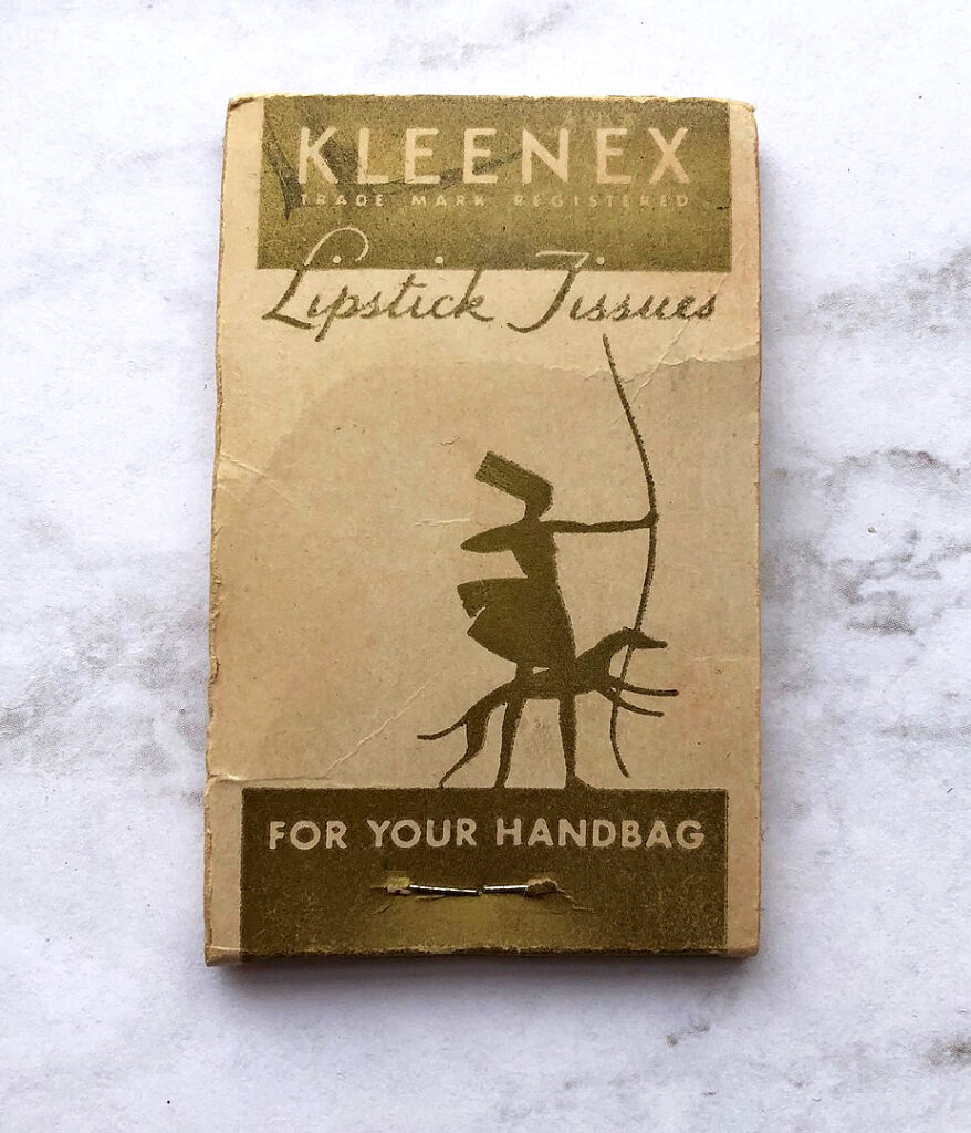 Vintage lipstick tissue packet with an illustration of a female huntress